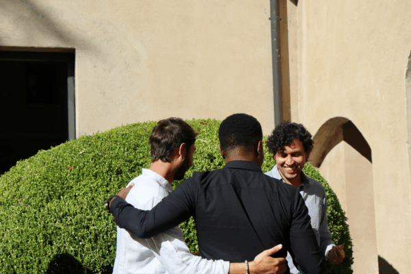 men talking and laughing