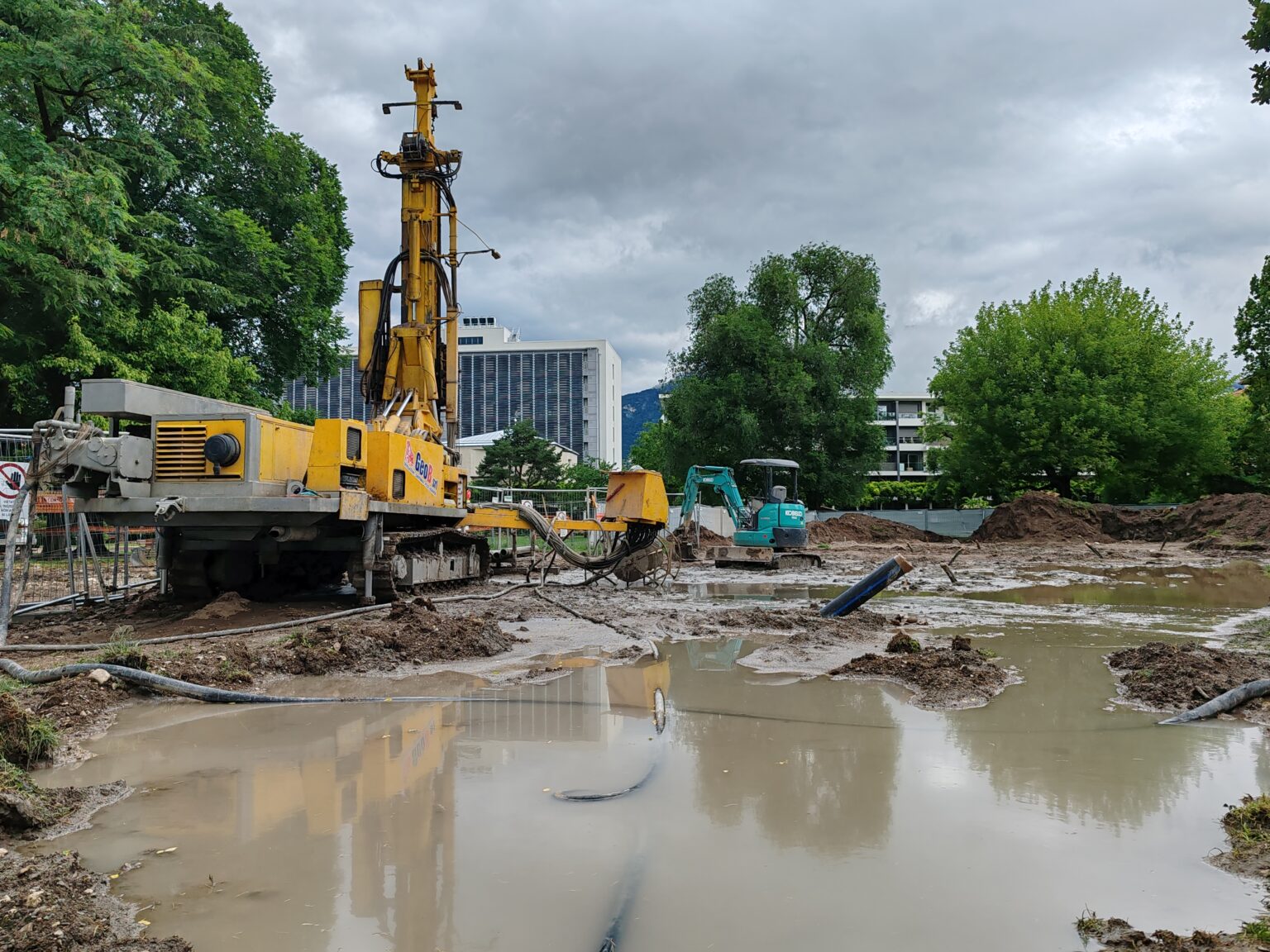 construction equipment and a big puddle