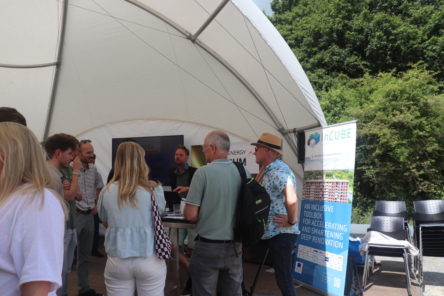people standing in a tent